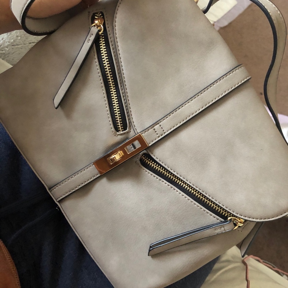 grey buckle purse
